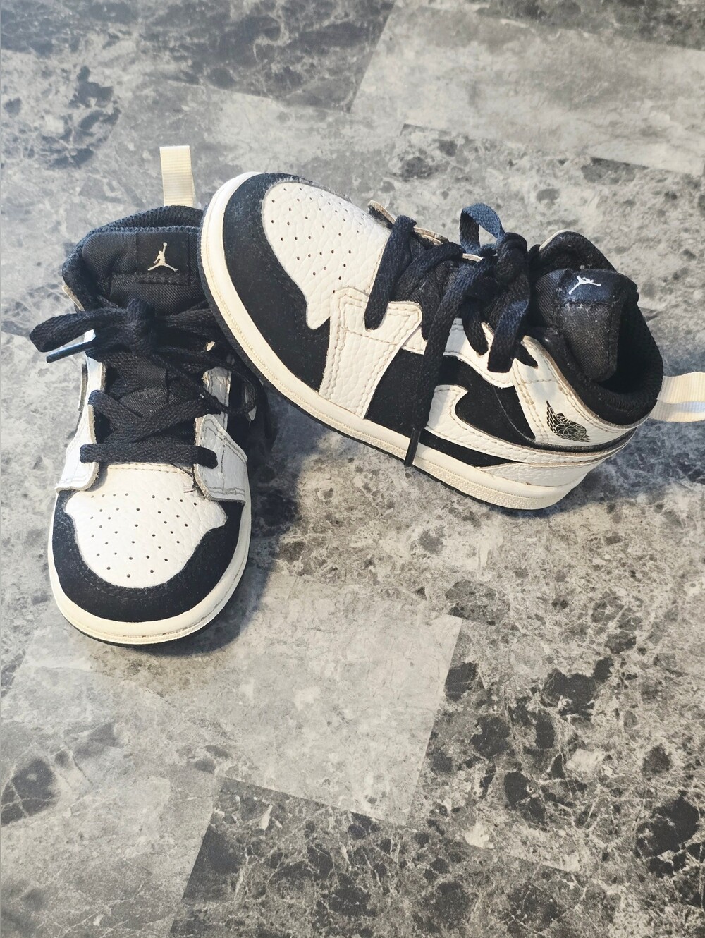 Jordan Kids Black and White High-Top Sneakers